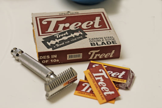 Vintage safety razor and treet carbon steel double edge blades.
