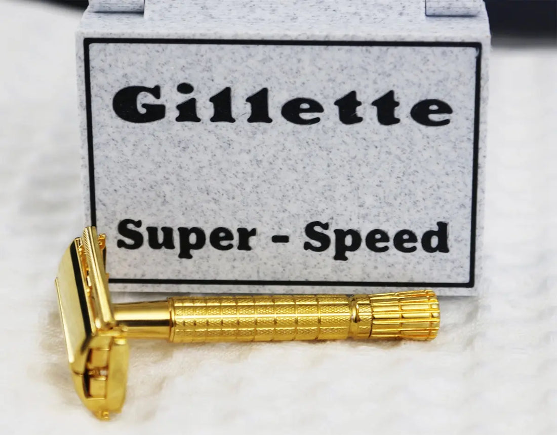 A gold gillette super-speed razor with its box.