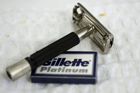 A vintage safety razor and gillette platinum blades.