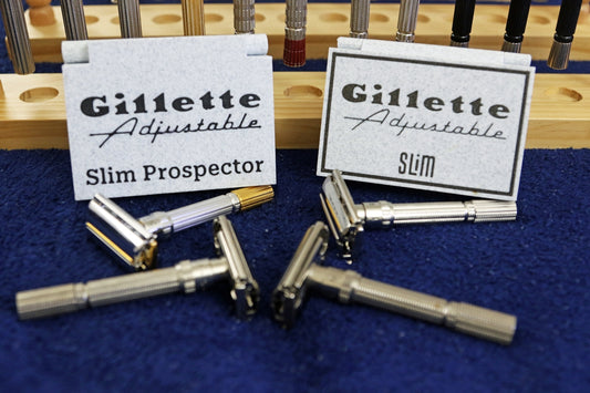 Four gillette adjustable slim razors with their original boxes.